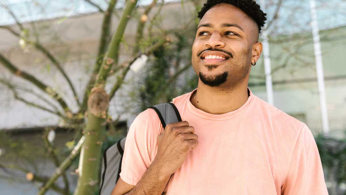 student with backpack